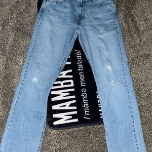 Levi’s 511 blue ripped jeans